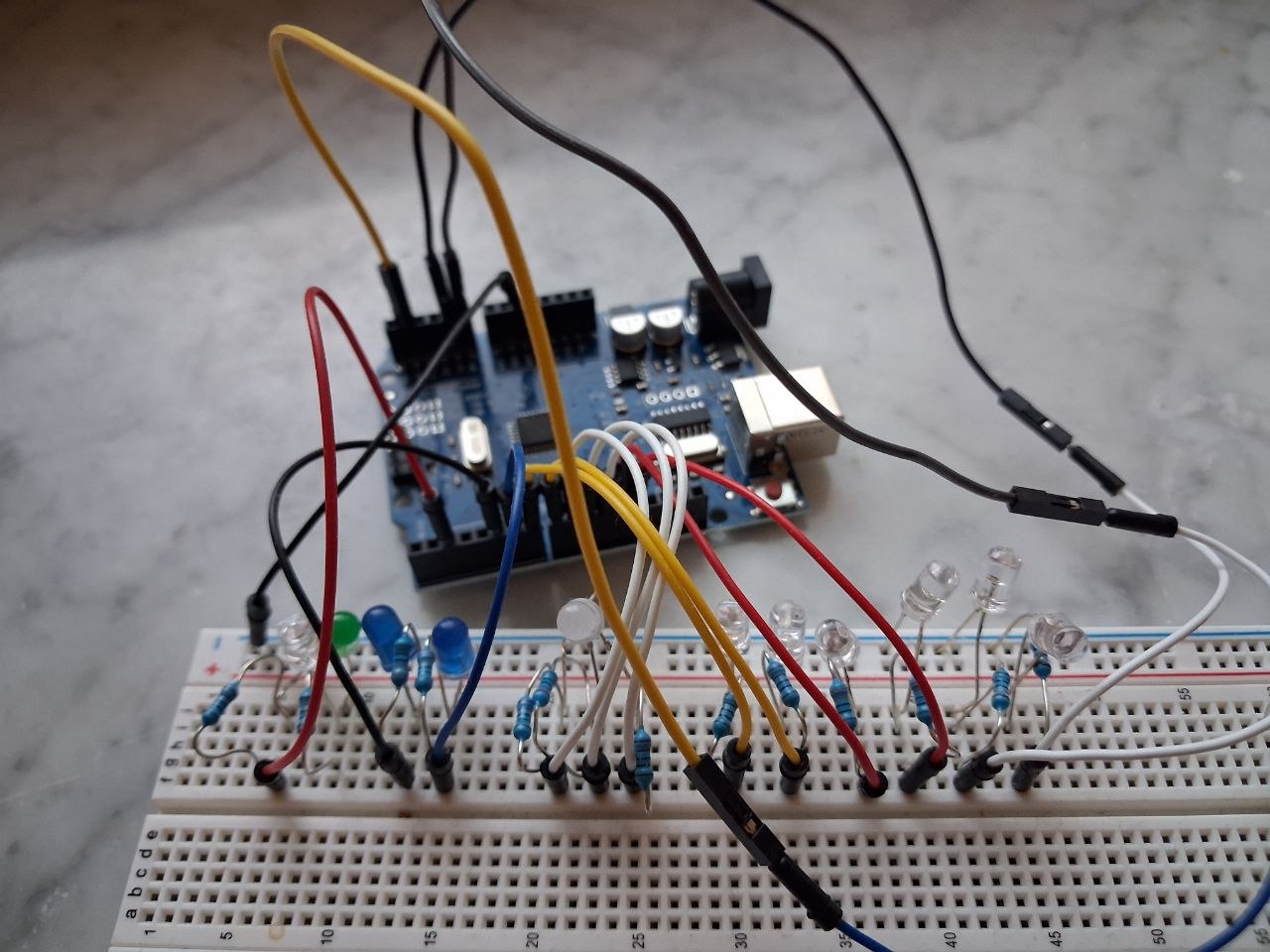 breadboard with LEDs and wires
